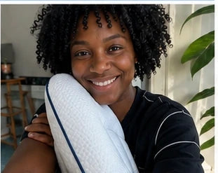 Parent with a ukola pillow